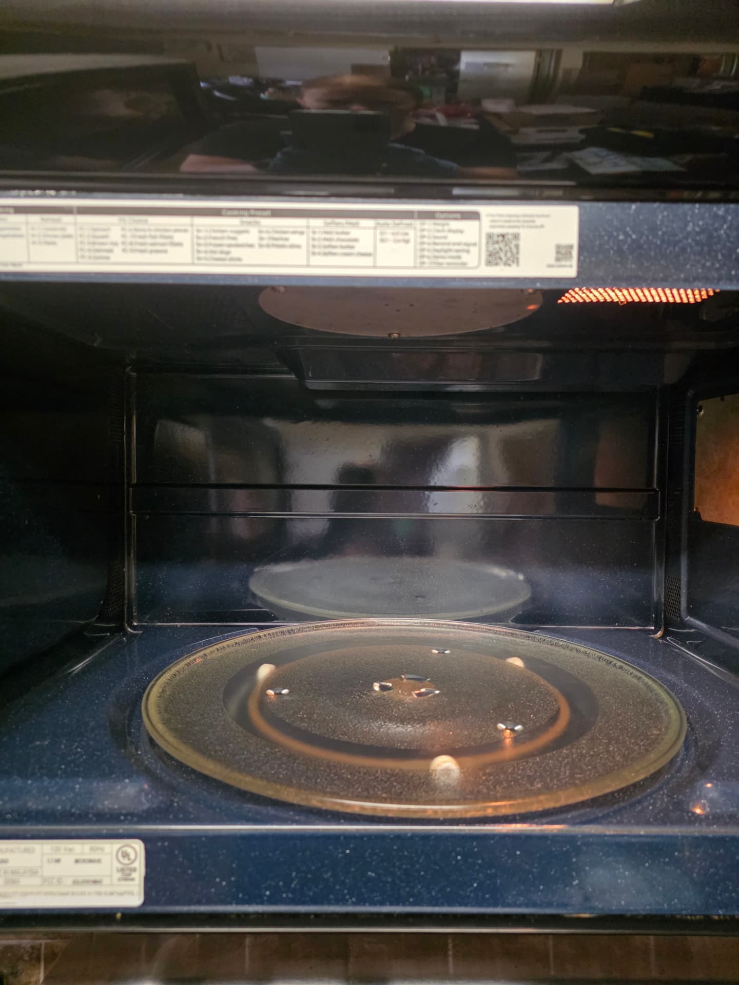 Microwave interior before and after cleaning — after