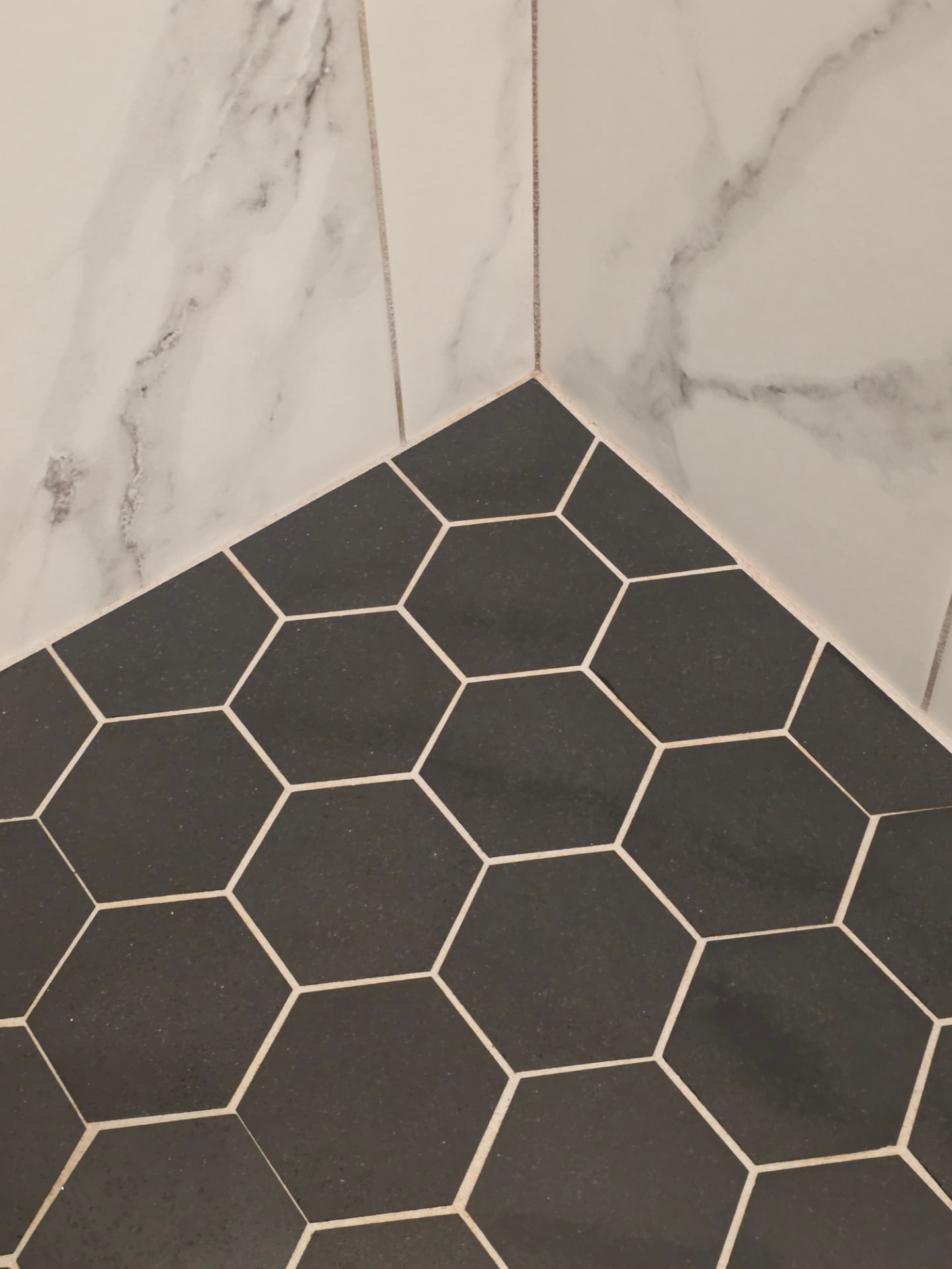 Hex tile floor and grout before and after deep cleaning — after