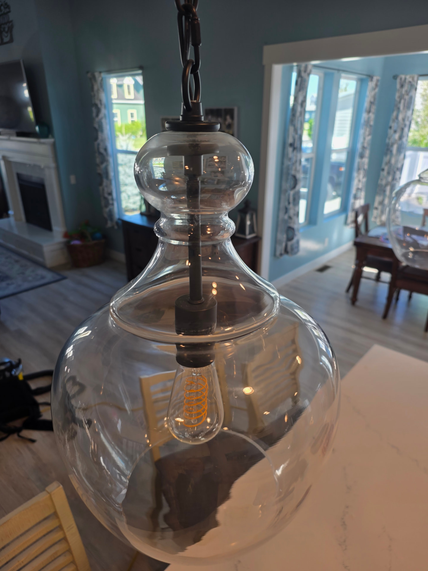 Glass pendant light before and after cleaning — after
